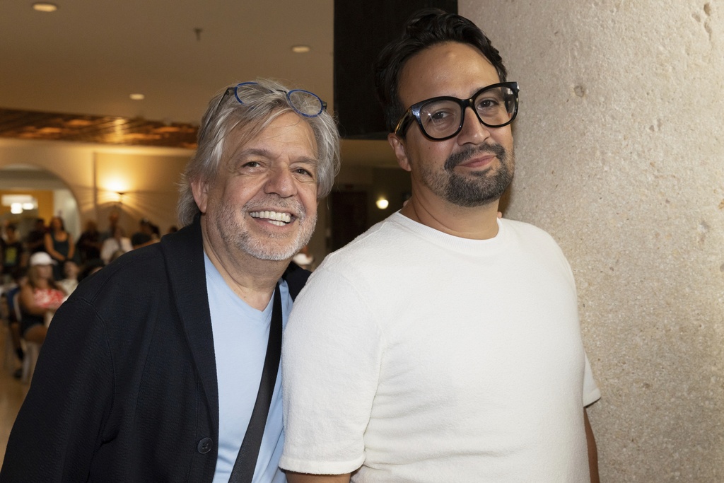 Lin-Manuel Miranda, right, poses with his father, Luis A. Miranda Jr., during the closing event of the Flamboyan Arts Fund in San Juan, Puerto Rico, Saturday, Sept. 13, 2025. (AP Photo/Alejandro Granadillo)