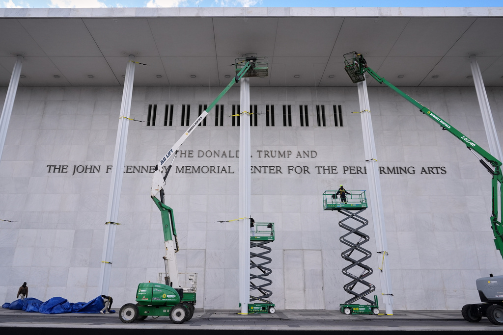 New signage, The Donald J. Trump and The John F. Kennedy Memorial Center for the Performing Arts, is unveiled on the Kennedy Center, Friday, Dec. 19, 2025, in Washington. (AP Photo/Jacquelyn Martin)