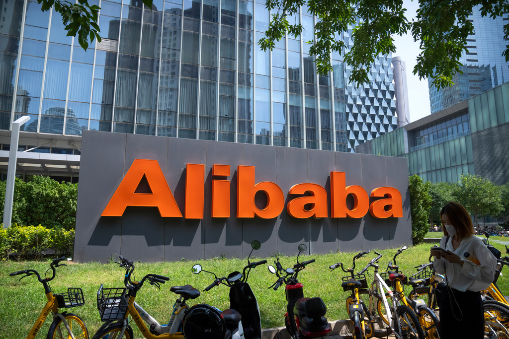 FILE - The logo of Chinese technology firm Alibaba is seen at its office in Beijing, Aug. 10, 2021. (AP Photo/Mark Schiefelbein, File)