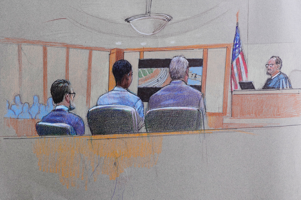 FILE - A courtroom sketch provided by Pat Lopez shows Karmelo Anthony, center, at the defense table, the jury on the left and the presiding judge on the right, June 4, 2026, in McKinney, Texas, during the trial of a teen accused of fatally stabbing another during a track meet in suburban Dallas last year. (Pat Lopez via AP, File)