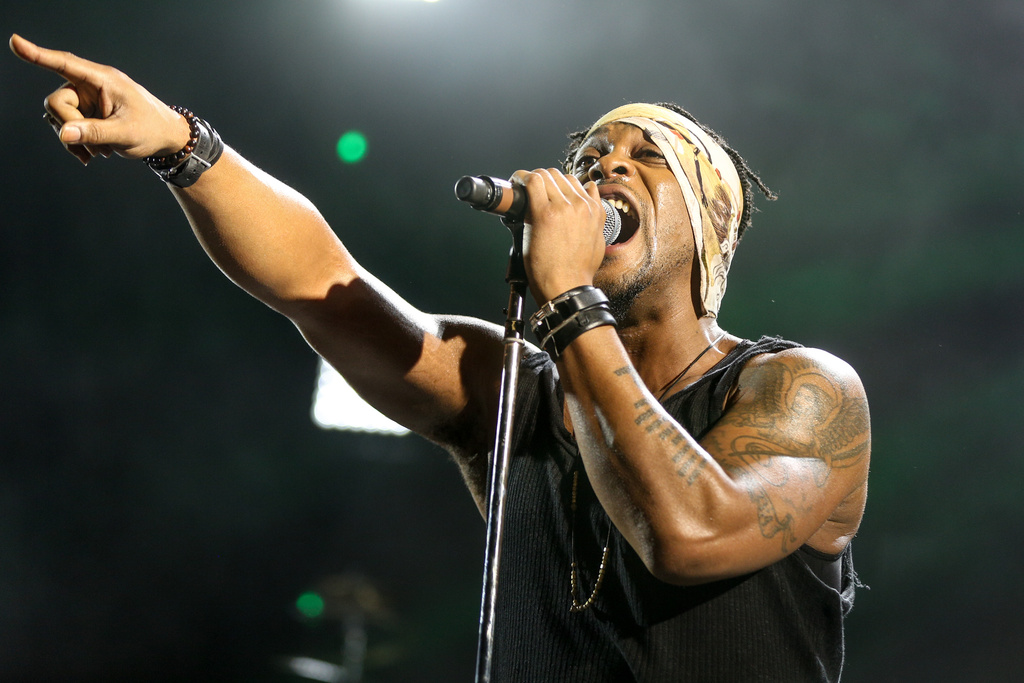 FILE - D'Angelo performs during FYF Fest at L.A. Memorial Sports Arena & Exposition Park in Los Angeles, Aug. 23, 2015. (Photo by Rich Fury/Invision/AP, File)