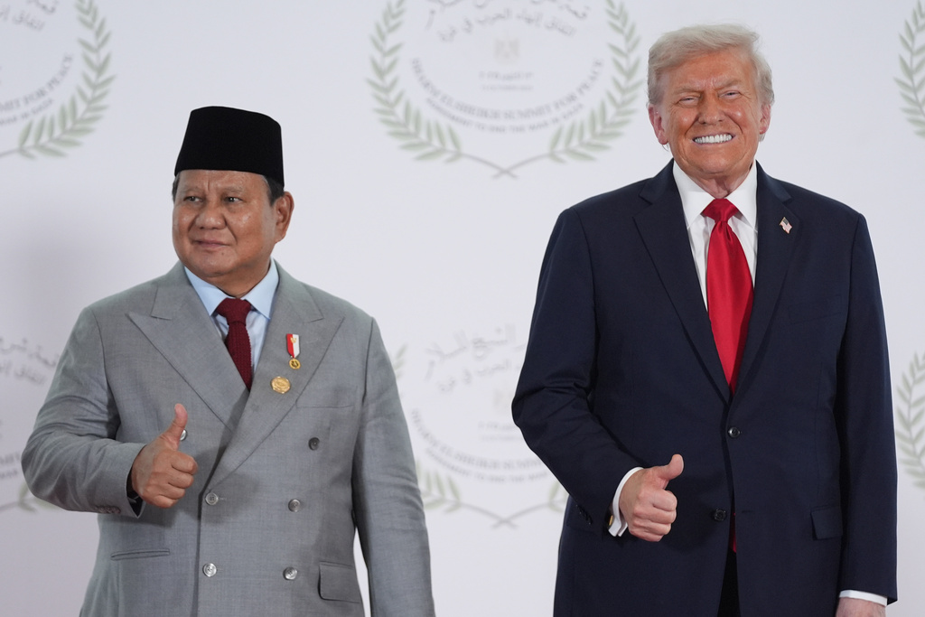 President Donald Trump greets Indonesia's President Prabowo Subianto during a summit to support ending the more than two-year Israel-Hamas war in Gaza after a breakthrough ceasefire deal, Monday, Oct. 13, 2025, in Sharm El Sheikh, Egypt. (AP Photo/Evan Vucci, Pool)
