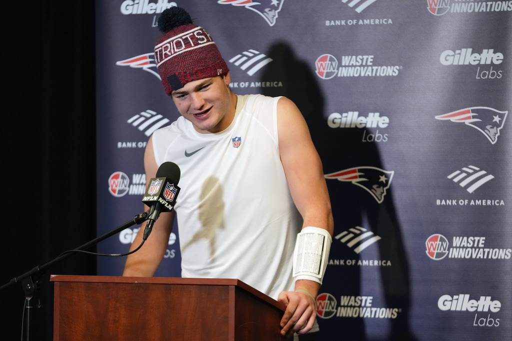 New England Patriots quarterback Drake Maye talks during a news conference after his team defeated the New York Jets in an NFL football game, Sunday, Dec. 28, 2025, in East Rutherford, N.J. (AP Photo/Frank Franklin)