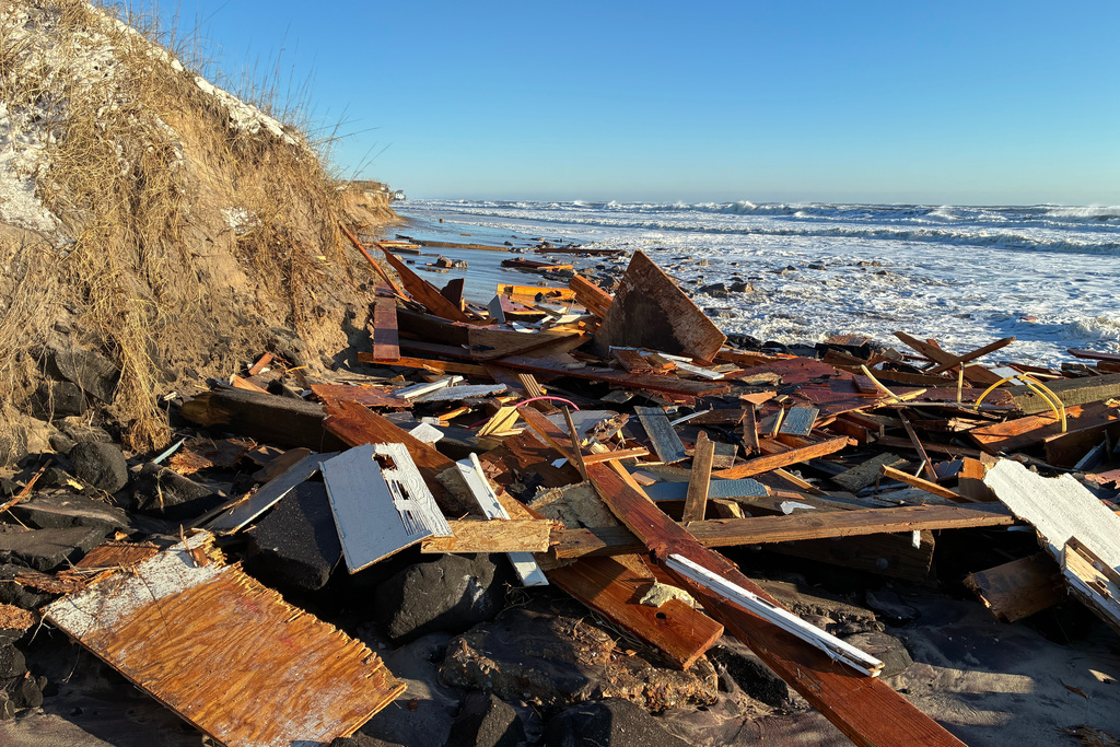 Debris from collapsed homes litter the shoreline in the Outer Banks village of Buxton, N.C., Feb. 2, 2026. (National Park Service via AP)
