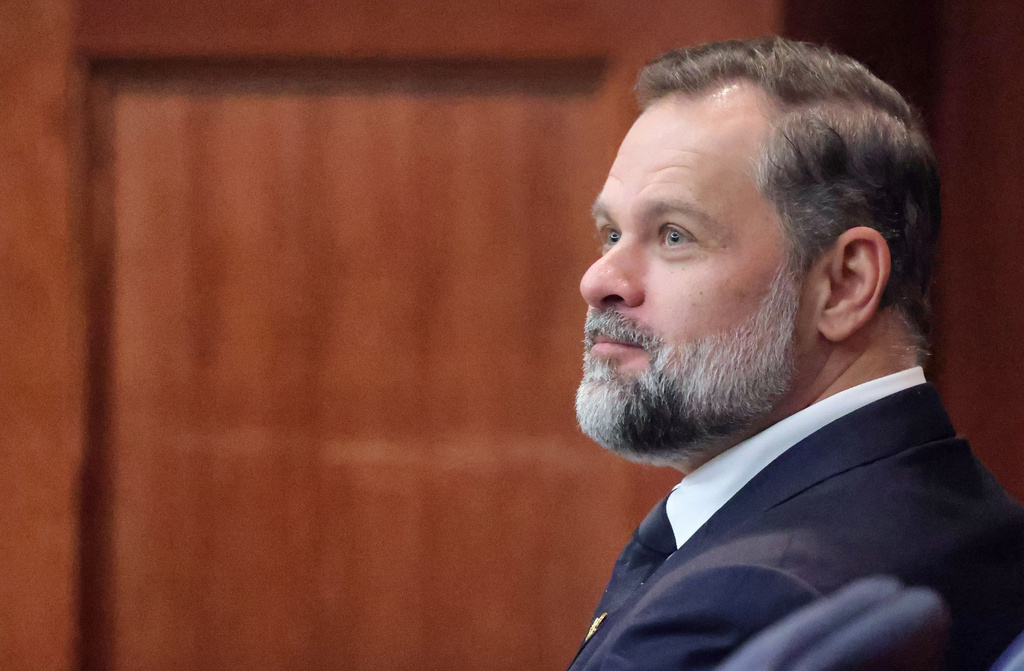 U.S. Rep. Cory Mills listens to the proceedings in Third Judicial Circuit court in Lake City, Fla., Friday, Sept. 26, 2025. (Joe Burbank/Orlando Sentinel via AP)