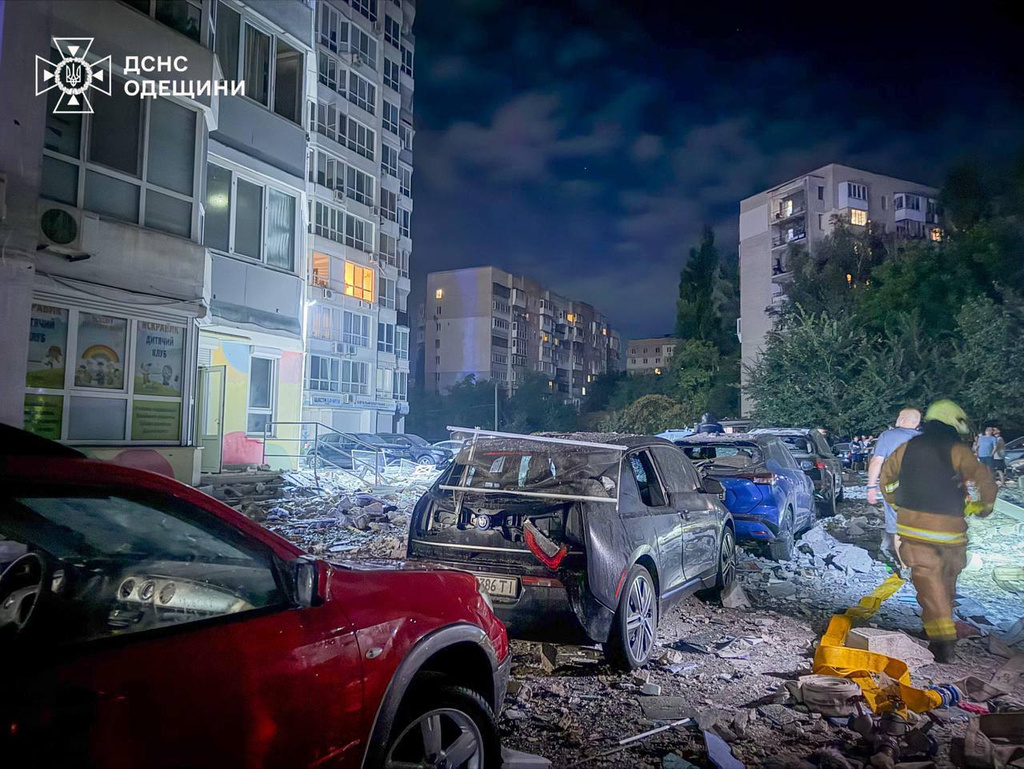 In this photo provided by the Ukrainian Emergency Service, firefighters arrive to put out a fire in a residential building after a Russian drone attack in Odesa, Ukraine, Wednesday, Sept. 2, 2026. (Ukrainian Emergency Service via AP)