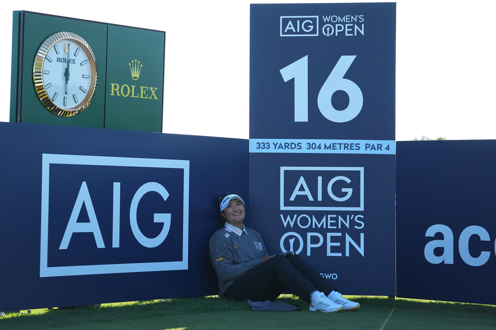 Haeran Ryu, of South Korea, sits on the 16th green during the third round of the Women's British Open golf championship in Lytham St Annes, England, Saturday, Aug. 1, 2026. (AP Photo/Jon Super)