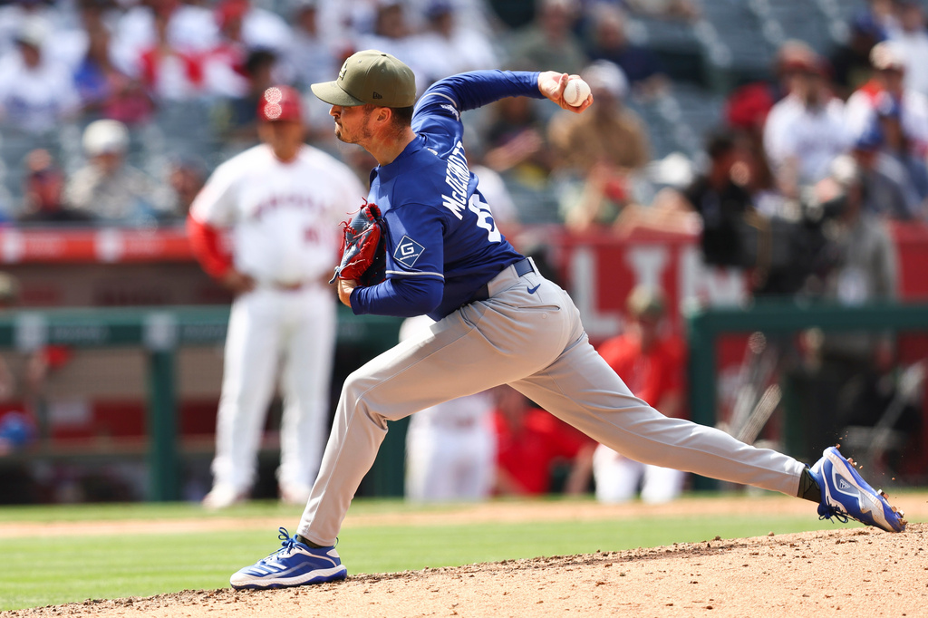 Los Angeles Dodgers pitcher Chayce McDermott throws to a Los Angeles Angels batter during the ninth inning of a baseball game, Sunday, May 17, 2026, in Anaheim, Calif. (AP Photo/Jessie Alcheh)