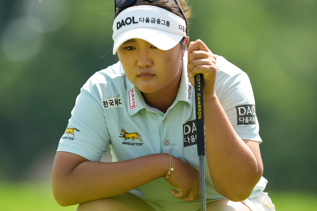 Haeran Ryu lines up her shot from the ninth hole during the final round of the Queen City Championship LPGA golf tournament, Sunday, May 17, 2026, in Cincinnati. (AP Photo/Jeff Dean)