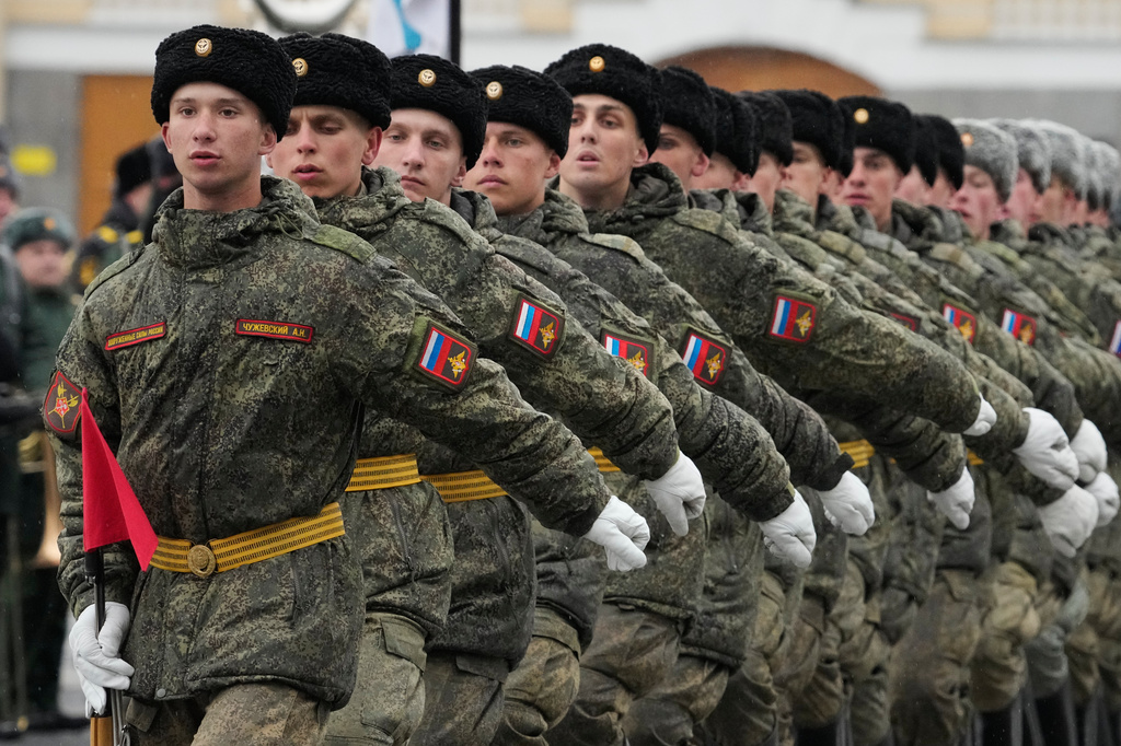 Troops march during a rehearsal for the Victory Day military parade at the Dvortsovaya (Palace) Square in St. Petersburg, Russia, Tuesday, April 28, 2026. (AP Photo/Dmitri Lovetsky)