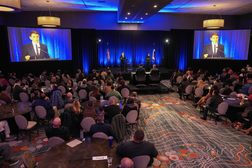 Democratic primary candidates for U.S. Senate, Texas state Rep. James Talarico, D-Austin, left, and Rep. Jasmine Crockett, right, participate in a debate during the Texas AFL-CIO Committee on Political Education Convention, Saturday, Jan. 24, 2026, in Georgetown, Texas. (Bob Daemmrich/Texas Tribune via AP, Pool)