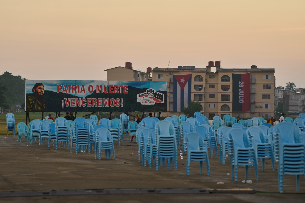 A billboard depicting the late leader Fidel Castro and reading "Homeland or death, we will defeat!" is seen after an event marking the 73th anniversary of the start of the Cuban Revolution in Pinar del Rio, Cuba, Sunday, July 26, 2026. (AP Photo/Ramon Espinosa)