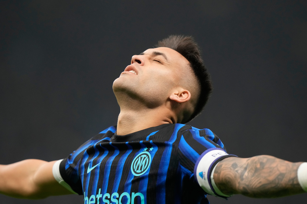 Inter Milan's Lautaro Martinez celebrates after scoring his side's opening goal during a Serie A soccer match between Inter Milan and Lazio, in Milan, Italy, Sunday, Nov. 9, 2025. (AP Photo/Luca Bruno)