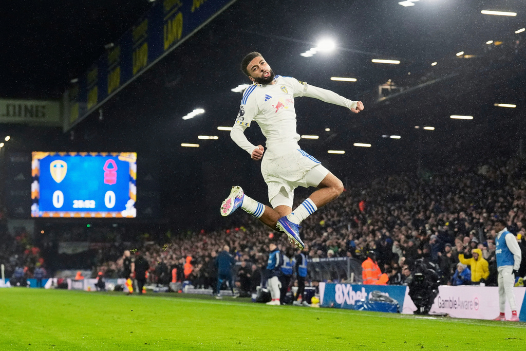 Leeds United's Jayden Bogle celebrates scoring their first goal during the English Premier League soccer match between Leeds United and Nottingham Forest in Leeds, England, Friday Feb. 6, 2026. (Danny Lawson/PA via AP)