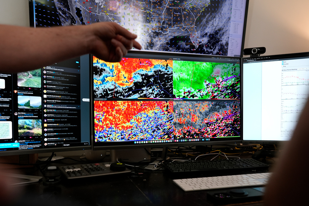 Weather information is displayed on a monitor at the Nashville Severe Weather headquarters Monday, April 20, 2026, in Nashville, Tenn. (AP Photo/George Walker IV)