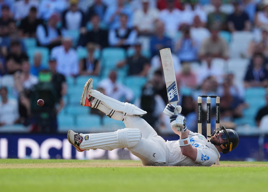 New Zealand's Glenn Phillips is hit by England's Jofra Archer bowl on day one of the second cricket test between England and New Zealand in London, Wednesday, June 17, 2026. (Ben Whitley/PA via AP)
