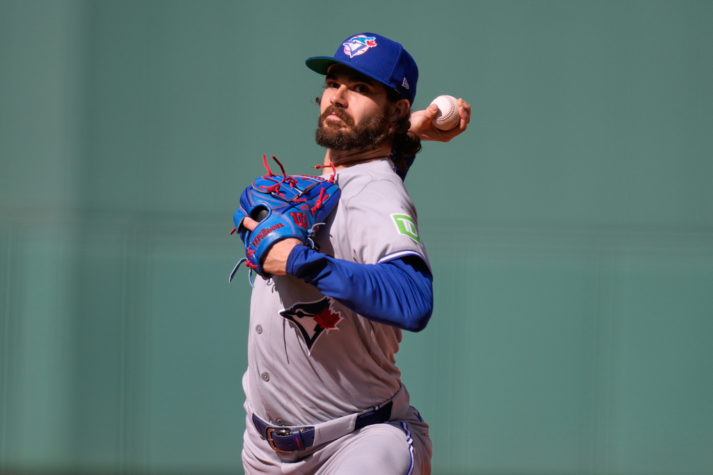 Toronto Blue Jays' Dylan Cease starting pitcher delivers during the first inning of a baseball game against the Boston Red Sox, Saturday, July 25, 2026, in Boston. (AP Photo/Charles Krupa)