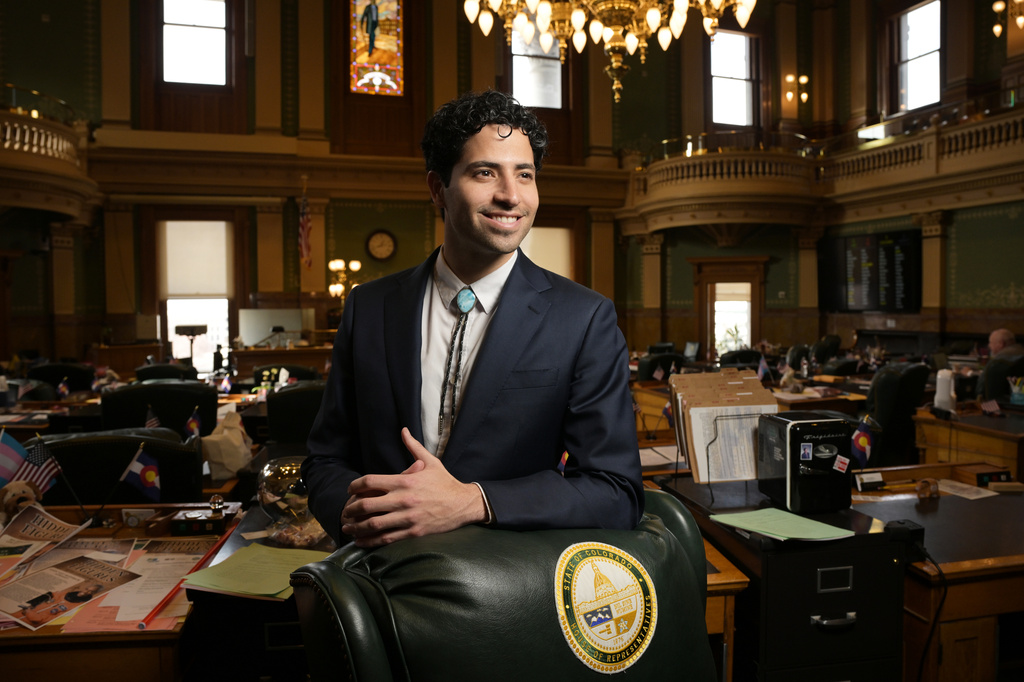 Colorado state Rep. Manny Rutinel, D-Commerce City, Democratic candidate for the 8th Congressional District, poses for a photo in the House Chamber of the Colorado State Capitol in Denver on Feb. 20, 2026. (Hyoung Chang/The Denver Post via AP)