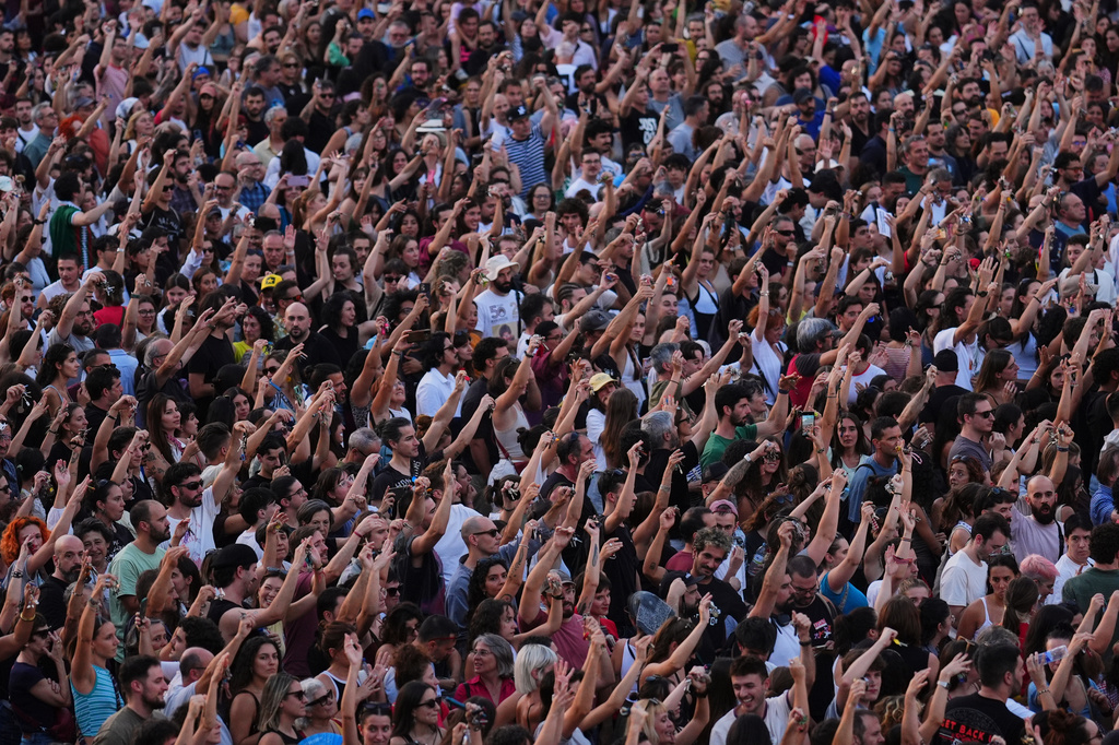 People gather during a protest following the eviction last Wednesday of 87-year-old Maricarmen to demand stronger laws to protect renters at Puerta del Sol in Madrid, Spain, Saturday, Sept. 26, 2026. (AP Photo/Manu Fernandez)