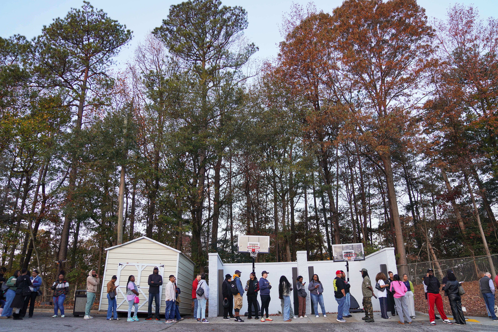 People wait in line before the 8:30 am church service at 2819 Church on Nov. 16, 2025, in Atlanta. (AP Photo/Jessie Wardarski)