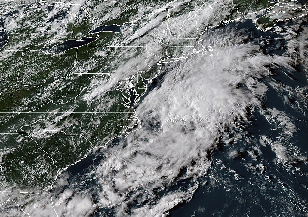 This satellite image proved by the National Oceanic and Atmospheric Administration (NOAA) shows Tropical Storm Fernand in the Atlantic off the east coast of the U.S. on Sunday, Aug. 24, 2025. (NOAA via AP)