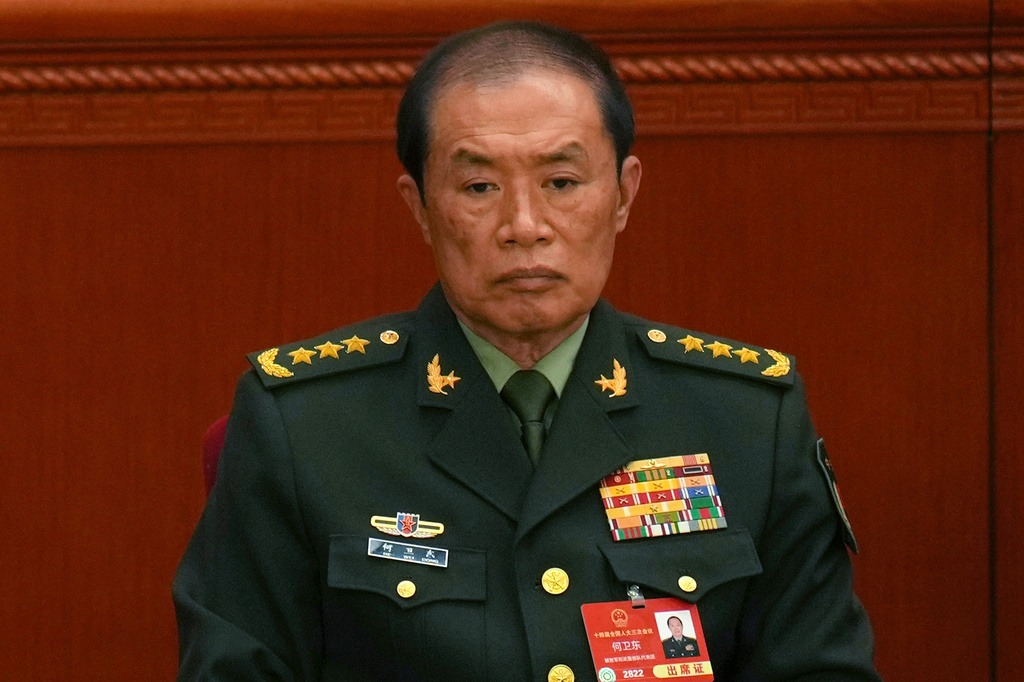 He Weidong, then vice-chair of the powerful Central Military Commission attends the opening session of the National People's Congress (NPC) at the Great Hall of the People in Beijing, China, on March 5, 2025. (AP Photo/Ng Han Guan)