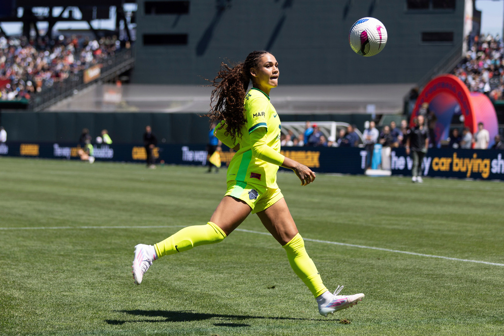 FILE - Washington Spirit's forward Trinity Rodman runs for a ball during the first half of a NWSL soccer match against Bay FC on Saturday, Aug. 23, 2025, in San Francisco. (AP Photo/Benjamin Fanjoy, File)
