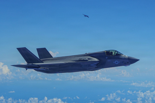In this image provided by the U.S. Air Force, a Marine Corps F-35B Lightning II aircraft flies alongside a U.S. Air Force B-52H Stratofortress bomber in the U.S. Southern Command area of responsibility, Oct. 15, 2025. (U.S. Air Force via AP) In this image provided by the U.S. Air Force, a Marine Corps F-35B Lightning II aircraft flies alongside a U.S. Air Force B-52H Stratofortress bomber in the U.S. Southern Command area of responsibility, Oct. 15, 2025. (U.S. Air Force via AP)