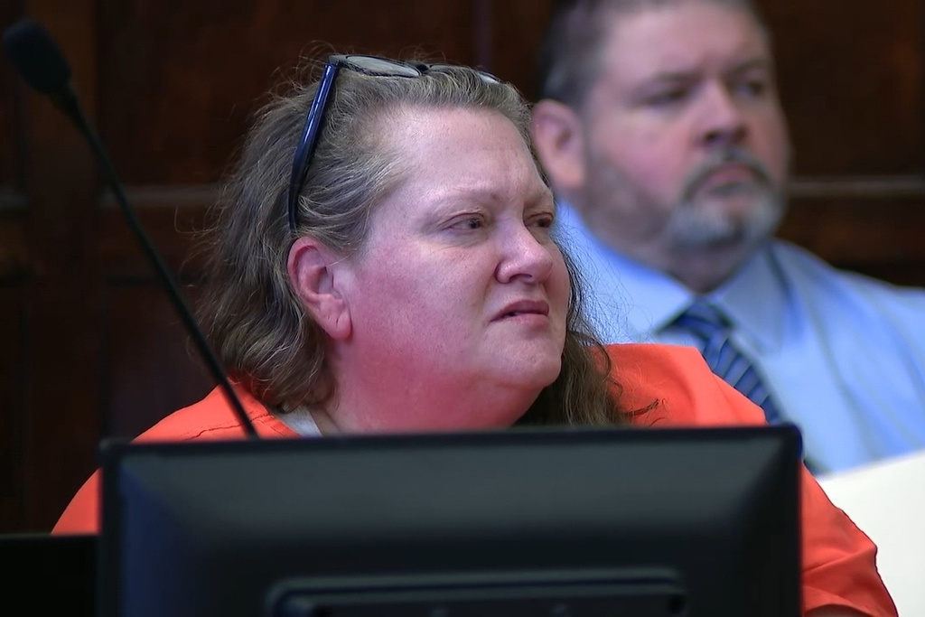 In this photo taken from video provided by WCHS-TV, Julie Miller is shown at her sentencing Wednesday, Feb. 25, 2026, in Madison, W.Va. (WCHS-TV via AP)