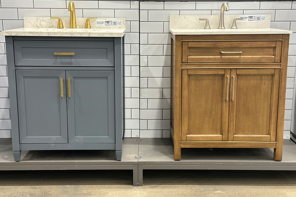 Bathroom vanities sit on display in a hardware store Friday, Sept. 26, 2025, in Nashville, Tenn. (AP Photo/George Walker IV)