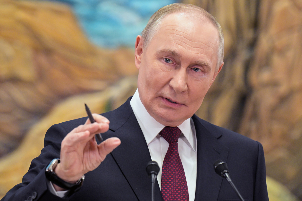FILE - Russian President Vladimir Putin gestures as he speaks to Russian journalists after the summit of the Collective Security Treaty Organisation (CSTO) in Bishkek, Kyrgyzstan, Nov. 27, 2025. (Alexei Nikolsky, Sputnik, Kremlin Pool Photo via AP, File)