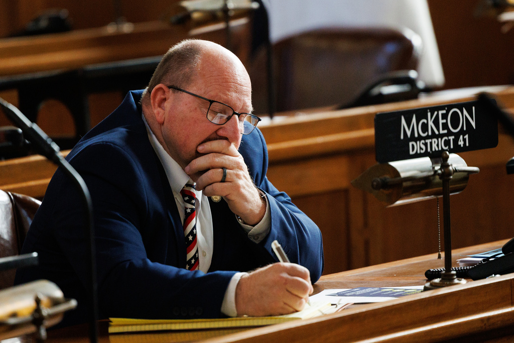 State Sen. Daniel McKeon takes notes during the first day of Nebraska's 2026 legislative session, Wednesday, Jan. 7, 2026, at the Nebraska State Capitol in Lincoln, Neb. (Nikos Frazier/Omaha World-Herald via AP)