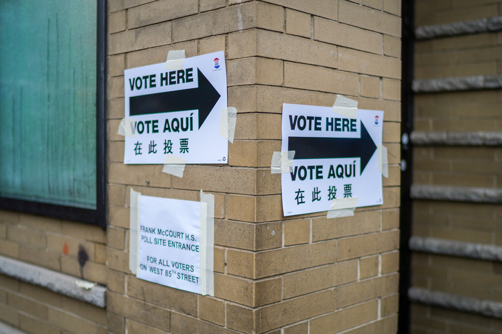 Voting signs are displayed outside a polling station on Election Day during New York’s primary election on Tuesday, June 23, 2026, in New York. (AP Photo/Ryan Murphy)