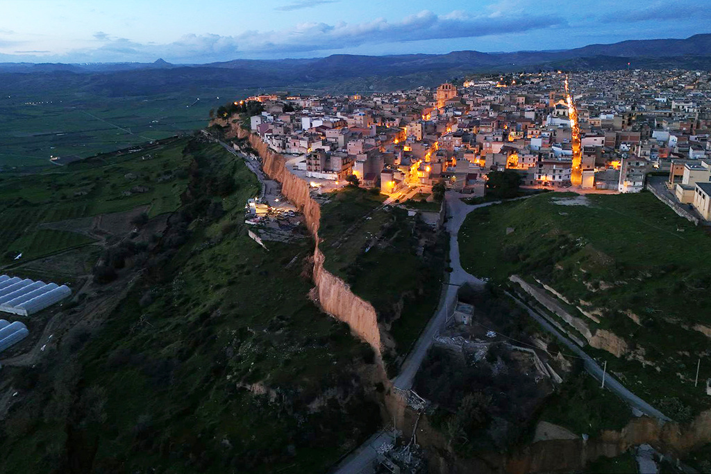 Aerial view of the village of Niscemi near the Sicilian town of Caltanissetta, southern Italy, Tuesday, Jan. 27, 2026, where severe storms provoked a landslide, and some 1,500 people had to be evacuated from their homes. (Alberto Lo Bianco/LaPresse via AP)