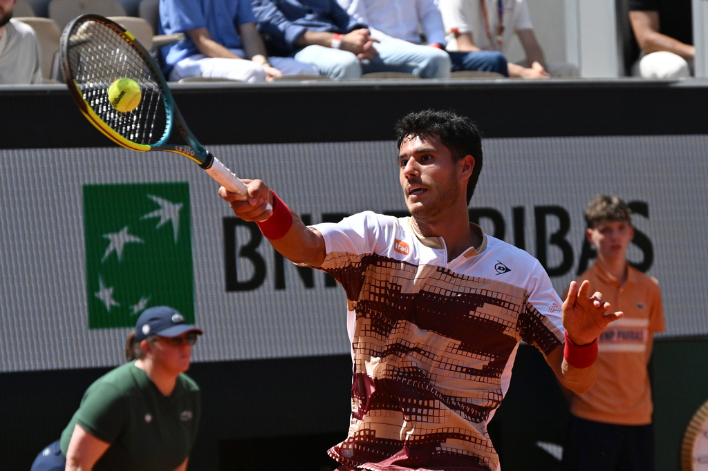 Adolfo Daniel Vallejo of Paraguay returns to Moise Kouame of France during their second round men's singles tennis match at the French Open tennis tournament in Paris, Thursday, May 28, 2026. (AP Photo/Emma Da Silva)