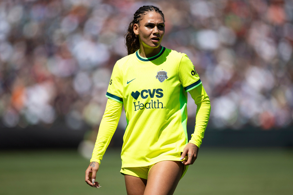 FILE - Washington Spirit's forward Trinity Rodman stands during the second half of a NWSL soccer match against Bay FC on Aug. 23, 2025, in San Francisco. (AP Photo/Benjamin Fanjoy, file)
