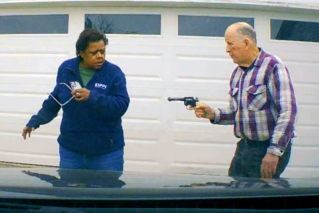 In this image taken from Uber dashcam video released by the Clark County, Ohio, Sheriff's Office, William Brock, right, holds a weapon to Uber driver Loletha Hall outside his home in South Charleston, Ohio, on March 25, 2024. (Clark County Sheriff's Office via AP)