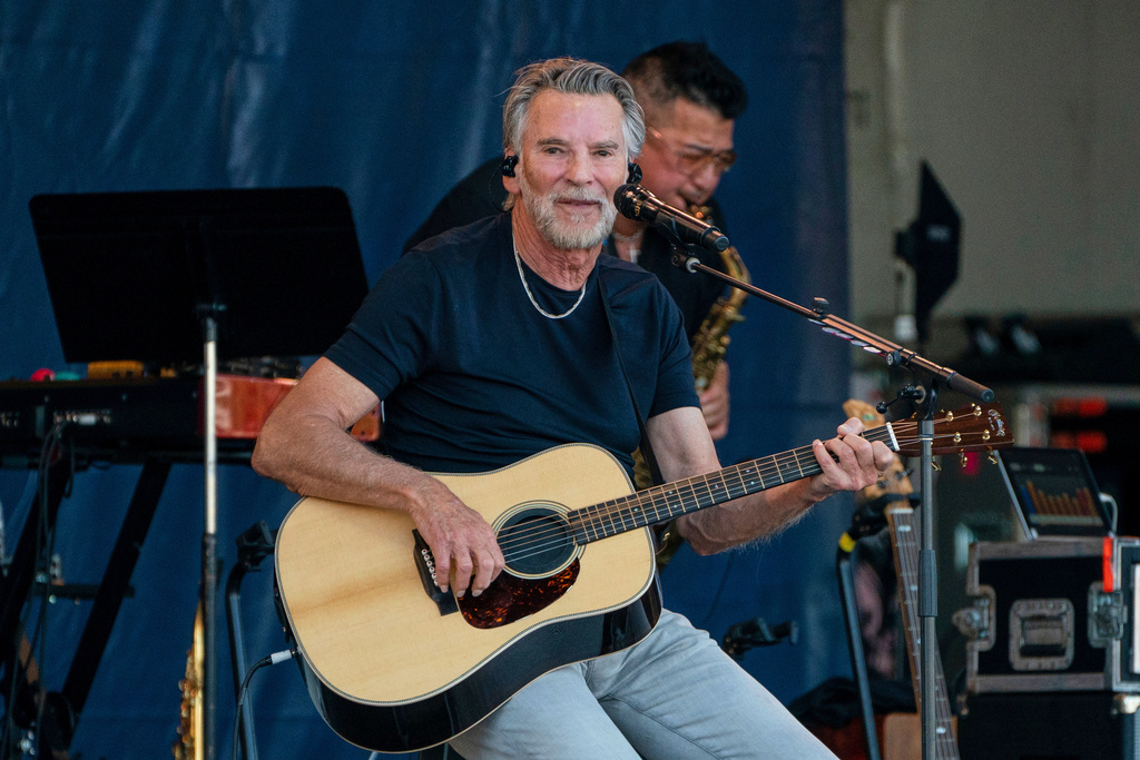 FILE - Kenny Loggins performs at the 2023 New Orleans Jazz & Heritage Festival on April 30, 2023. (Photo by Amy Harris/Invision/AP, File)