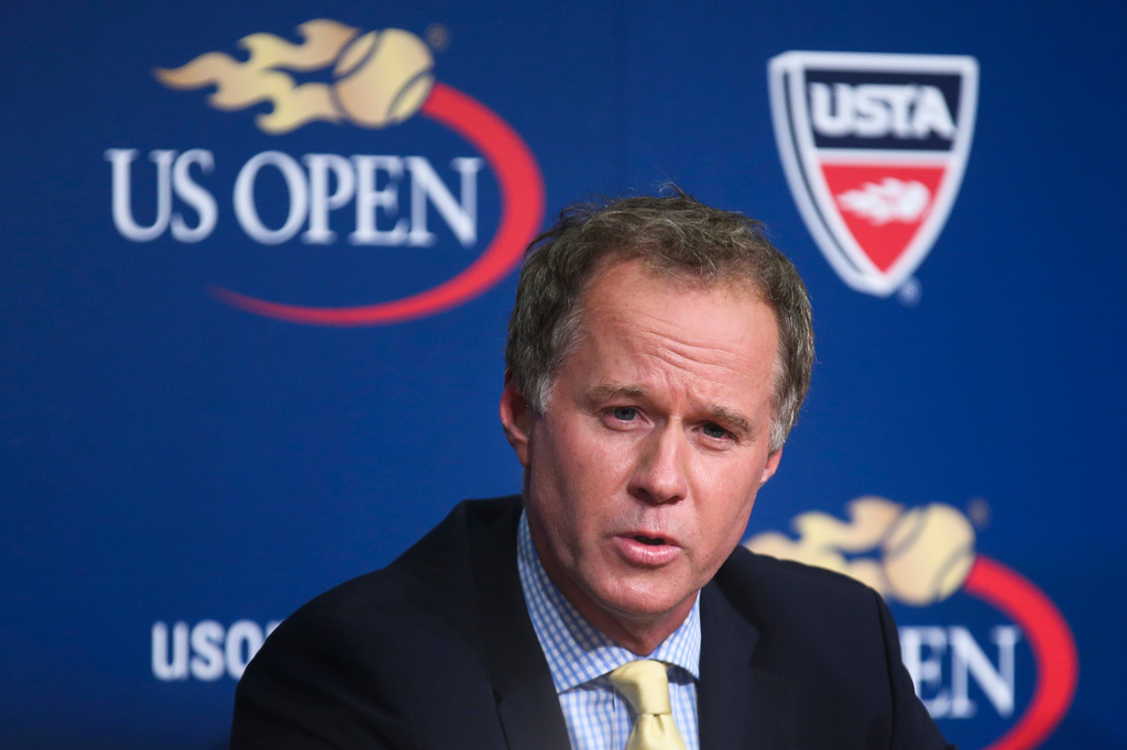 FILE - Patrick McEnroe speaks during a news conference at the U.S. Open tennis tournament in New York, Sept. 3, 2014. (AP Photo/John Minchillo, File)