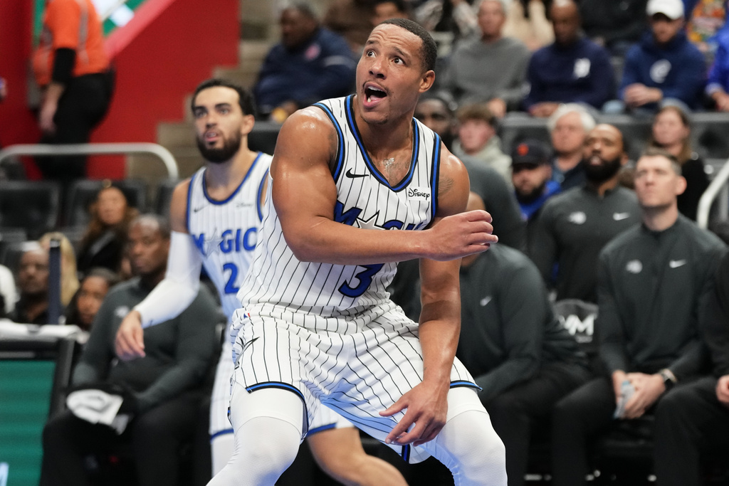 Orlando Magic guard Desmond Bane reacts after scoring during the first half of an NBA Cup basketball game against the Detroit Pistons, Friday, Nov. 28, 2025, in Detroit. (AP Photo/Ryan Sun)