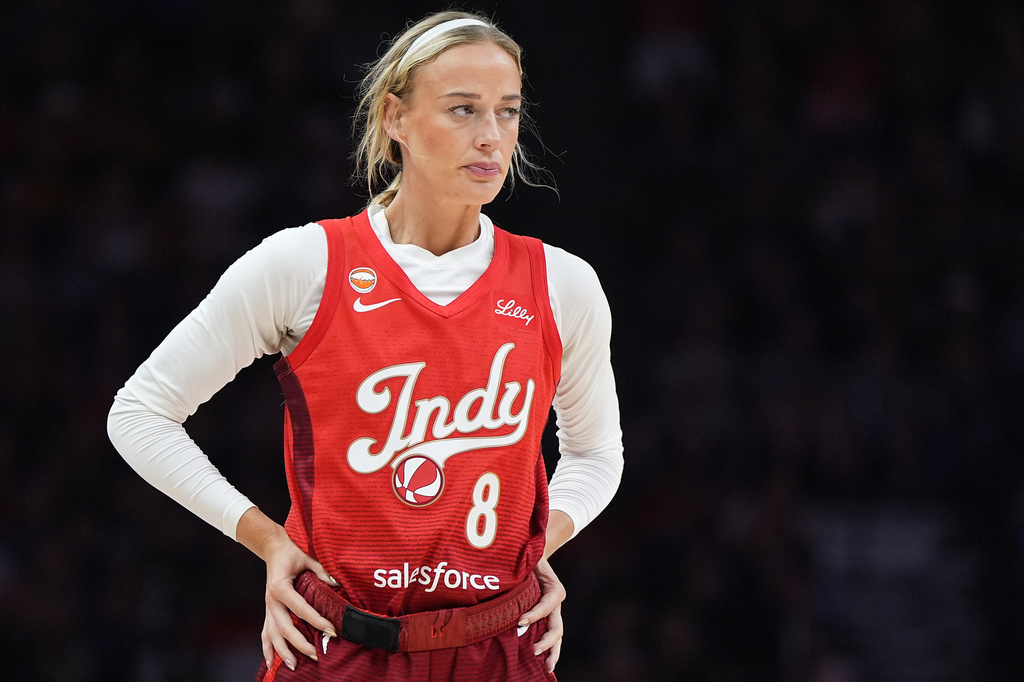 Indiana Fever guard Sophie Cunningham stands on the court during the first half of a WNBA basketball game against the Minnesota Lynx, Sunday, Aug. 2, 2026, in Minneapolis. (AP Photo/Abbie Parr)