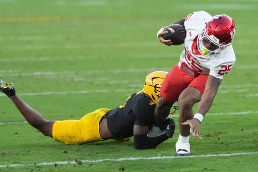 Arizona State defensive back Montana Warren stops Houston running back DJ Butler (25) just short of the endzone during the first half of an NCAA college football game Saturday, Oct. 25, 2025, in Tempe, Ariz. (AP Photo/Ross D. Franklin) Arizona State defensive back Montana Warren stops Houston running back DJ Butler (25) just short of the endzone during the first half of an NCAA college football game Saturday, Oct. 25, 2025, in Tempe, Ariz. (AP Photo/Ross D. Franklin)