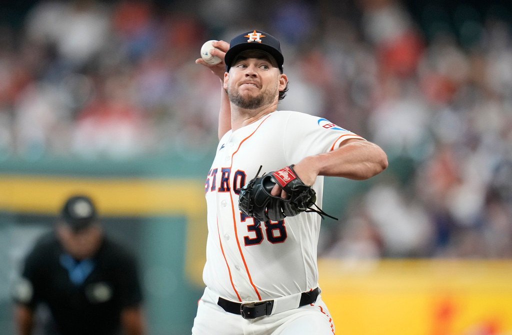 Houston Astros starting pitcher Peter Lambert delivers to Milwaukee Brewers' Christian Yelich during the first inning of a baseball game, Saturday, May 30, 2026, in Houston. (AP Photo/Karen Warren)