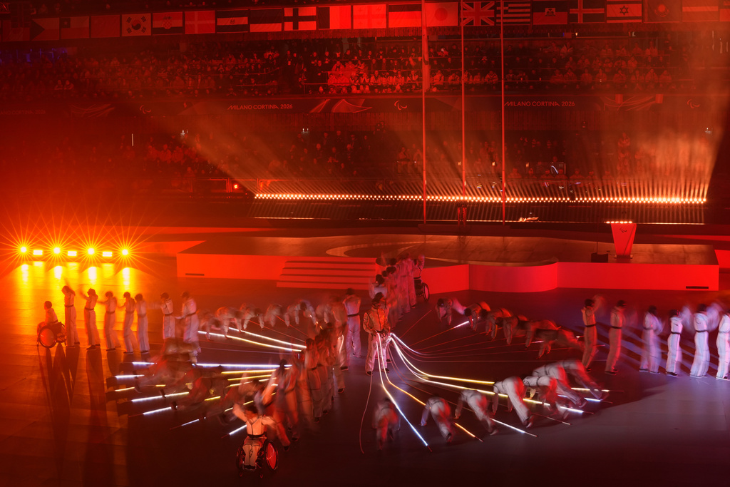 Dancers perform during the closing ceremony at the 2026 Winter Paralympics, in Cortina d'Ampezzo, Italy, Sunday, March 15, 2026. (AP Photo/Evgeniy Maloletka)