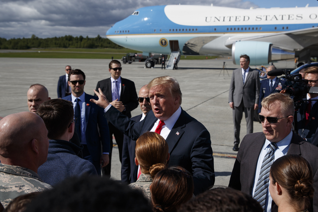 FILE - President Donald Trump greets troops after landing at Joint Base Elmendorf-Richardson for a refueling stop en route to Japan for a four-day state visit, May 24, 2019, in Anchorage. (AP Photo/Evan Vucci, File)