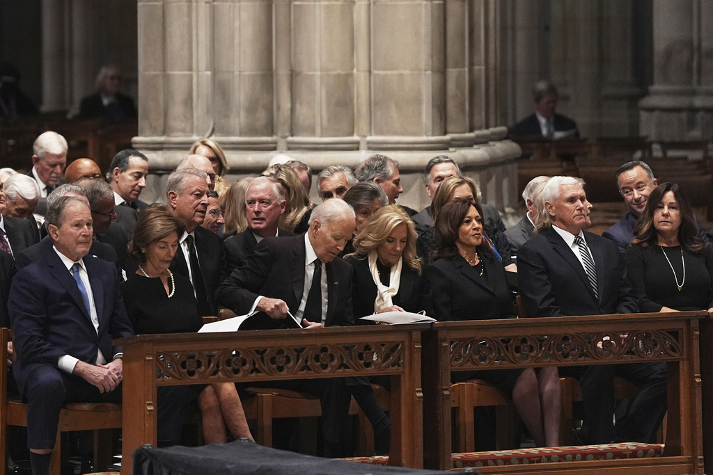 Former Presidents front row from left, George W. Bush with Laura Bush, Joe Biden with Jill Biden and former Vice Presidents Kamala Harris and Mike Pence with Karen Pence, right, during the funeral for former Vice President Dick Cheney at the Washington National Cathedral on Thursday, Nov. 20, 2025 in Washington. (AP Photo/Matt Rourke)