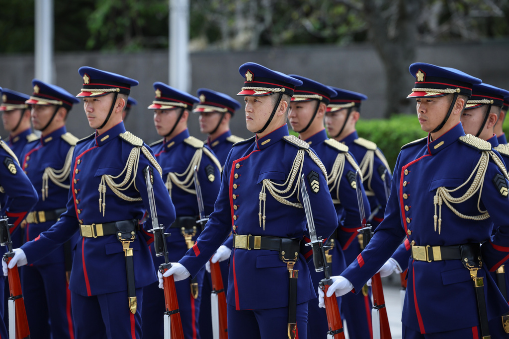 A guard of honor stands for inspection by U.S. Defense Secretary Pete Hegseth and Japan's Defense Minister Shinjiro Koizumi, both unseen, in Tokyo Wednesday, Oct. 29, 2025. (Takashi Aoyama/Pool Photo via AP)