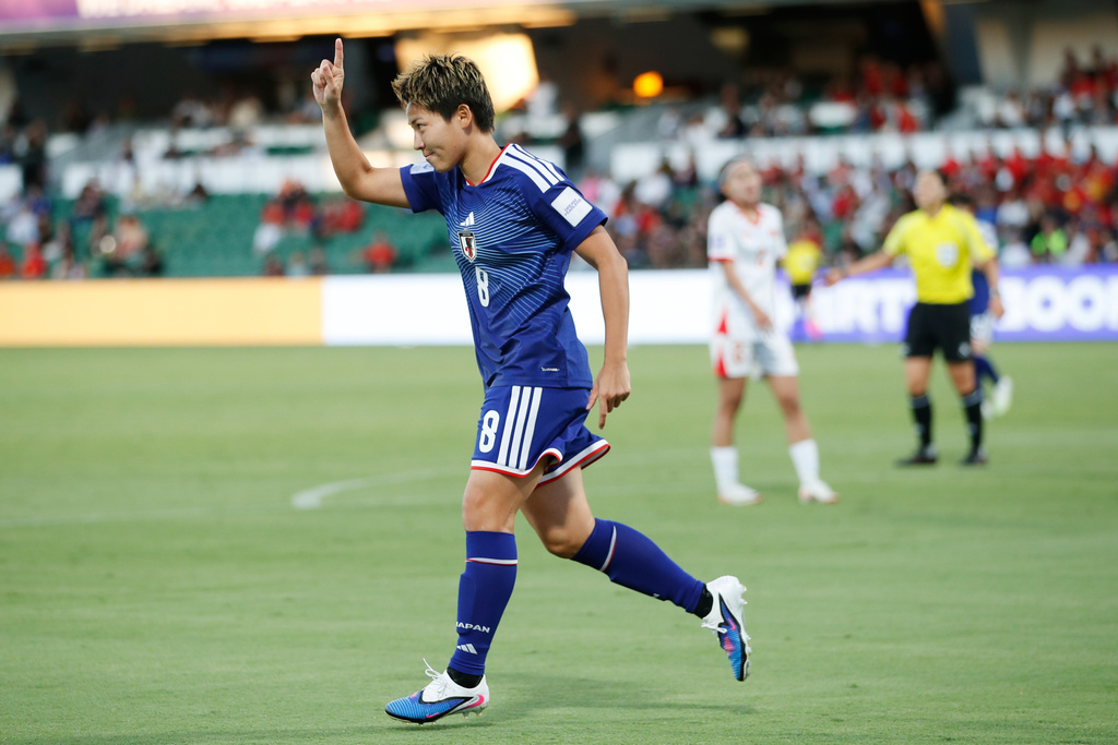 Japan's Kiko Seike celebrates after scoring her team's fourth goal during the Women's Asian Cup soccer match between Japan and Vietnam in Perth, Australia, Tuesday, March 10, 2026. (AP Photo/Gary Day)