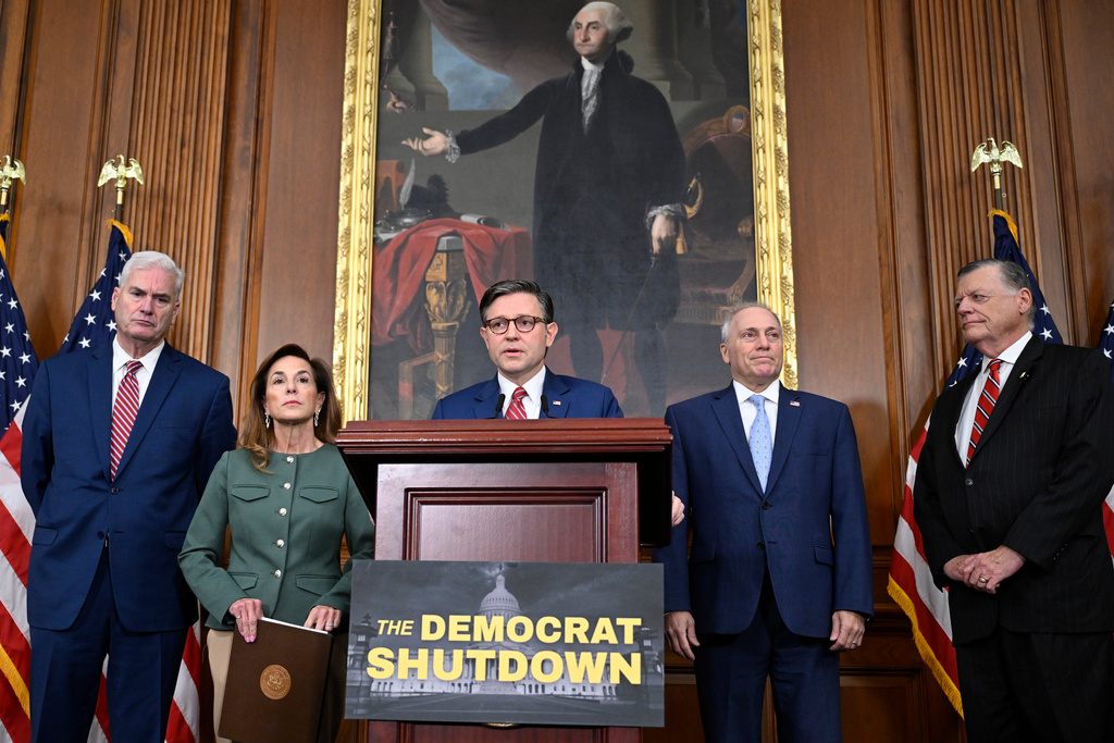 From left, House Majority Whip Tom Emmer, R-Minn., Chair of the House Republican Conference, Rep. Lisa McClain, R-Mich., Speaker of the House Mike Johnson, R-La., House Majority Leader Steve Scalise, R-La., and Chairman of the House Committee on Appropriations, Tom Cole, R-Okla., during a press conference on the 8th day of the government shutdown at the U.S. Capitol on Wednesday, Oct. 8, 2025, in Washington. (AP Photo/John McDonnell)
