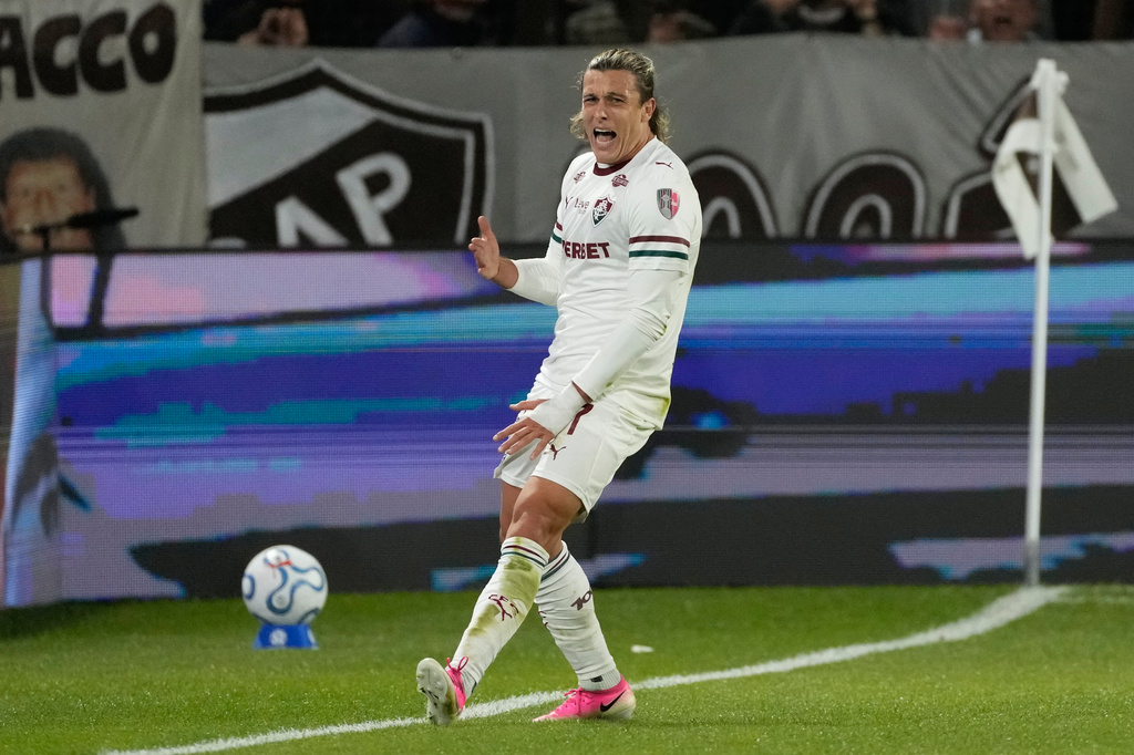 Agustin Canobbio of Brazil's Fluminense celebrates scoring his side's opening goal against Argentina's Platense during a Copa Libertadores quarter final second leg soccer match in Buenos Aires, Argentina, Tuesday, Sept. 15, 2026. (AP Photo/Gustavo Garello)